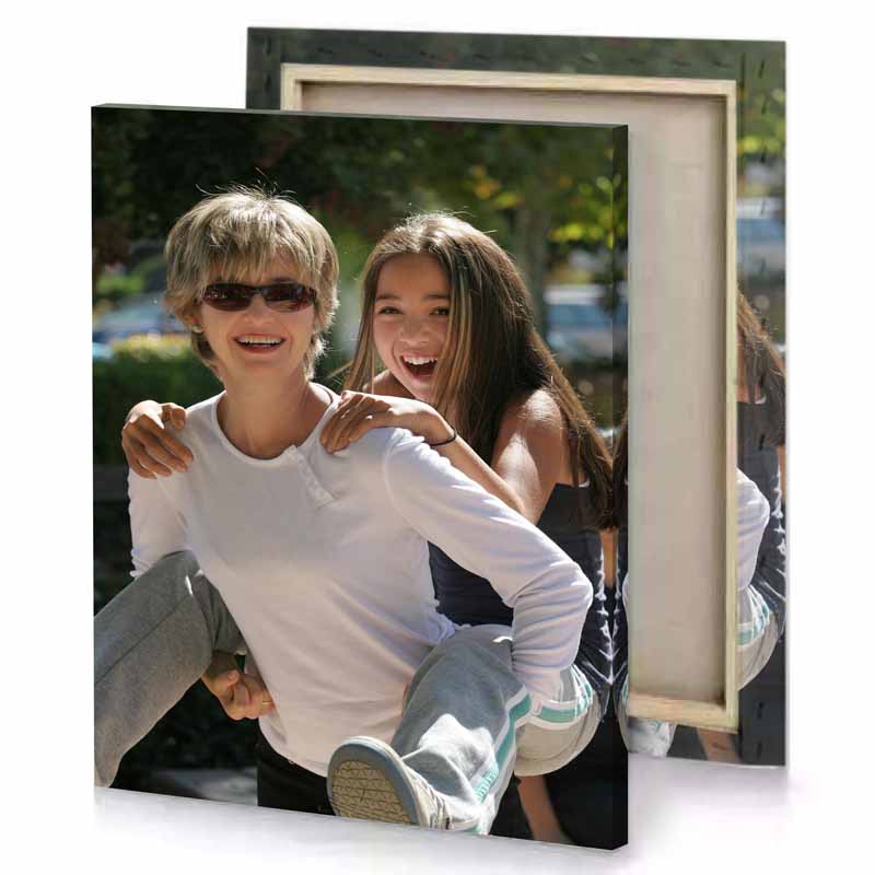 two young girls are sitting on a bench rose quartz canvas