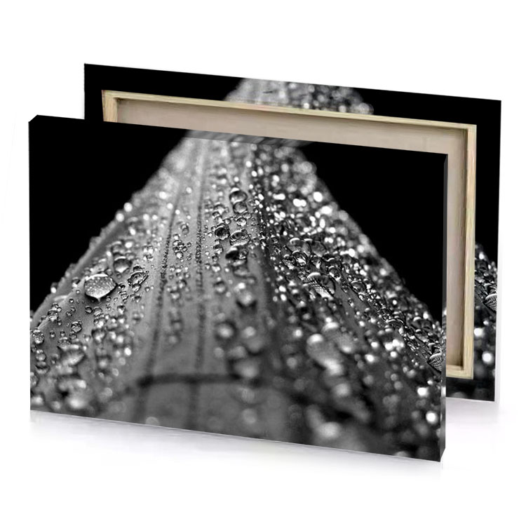 water drops on a metal pole gray canvas
